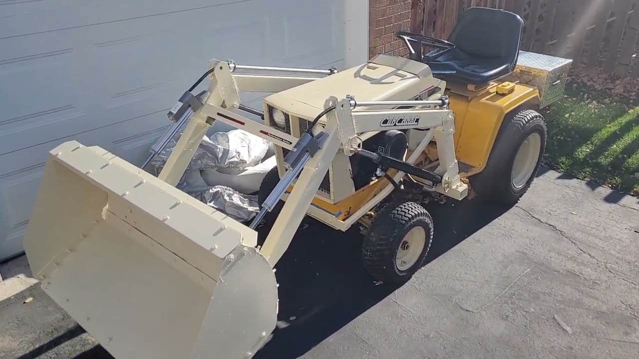 CUB CADET 129 WITH HOMEMADE FRONT END LOADER