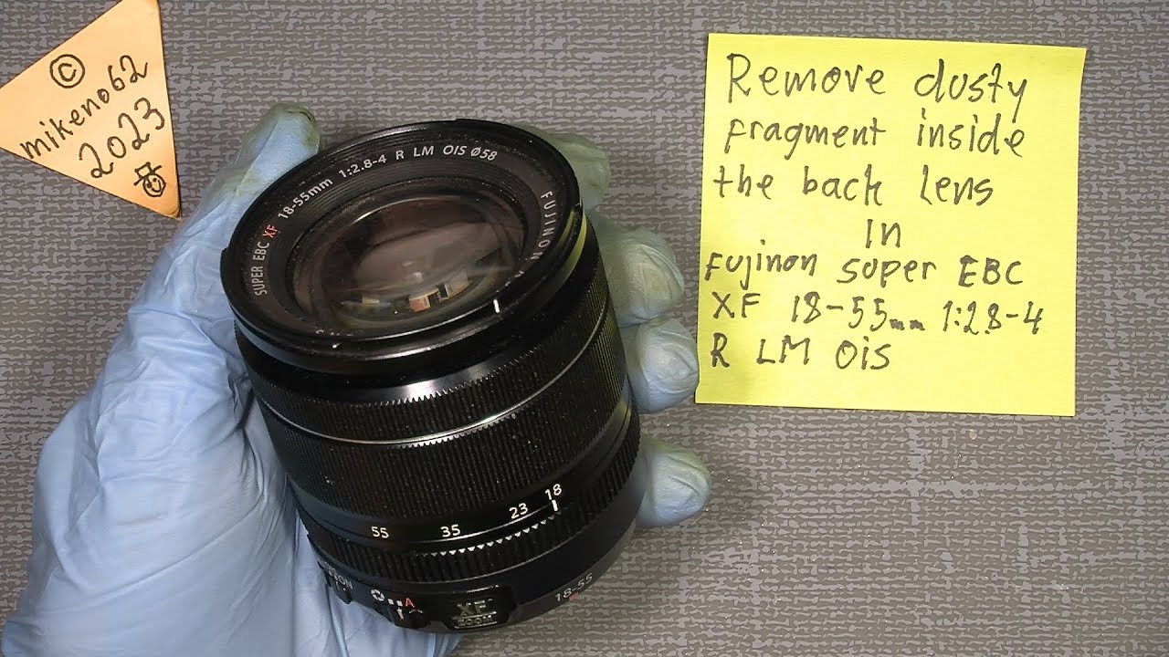 Remove dusty fragment inside the back lens In Fujinon Super EBC XF 18-55mm 1:2.8-4 R LM OIS