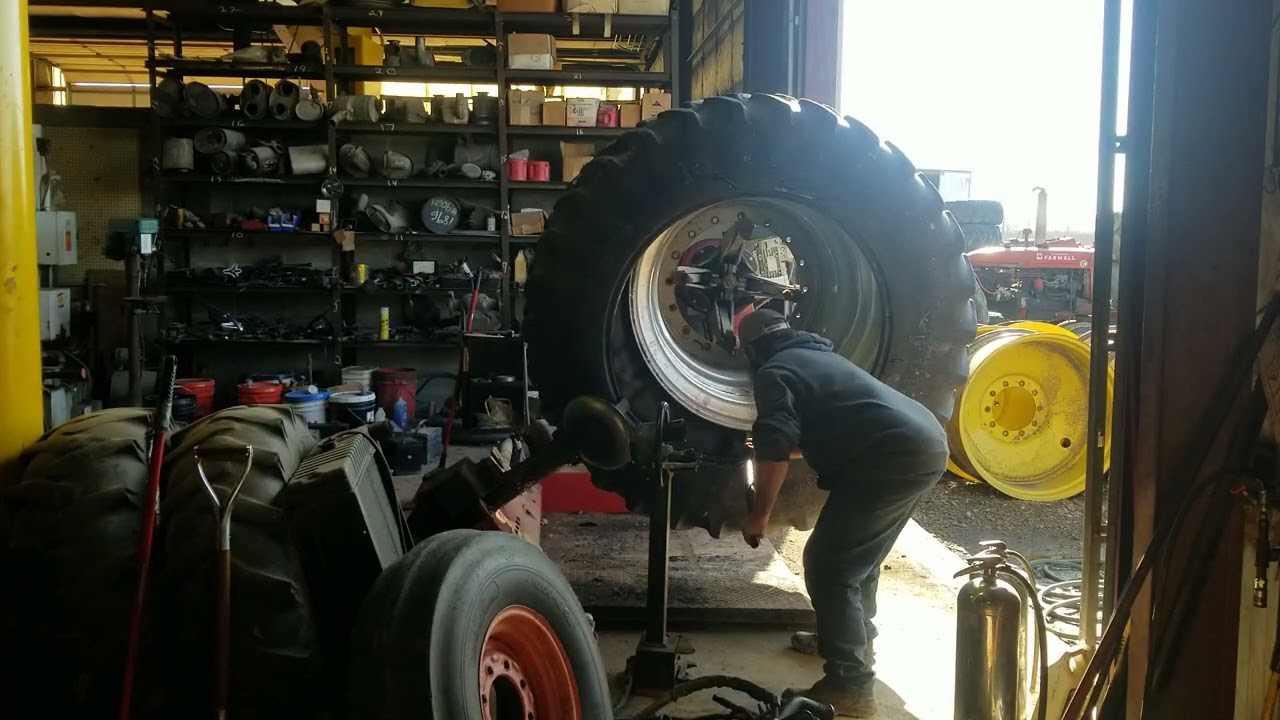 Breaking down a combine tire the easy way! #caseih #John deere #versatile tractor. #newholland.