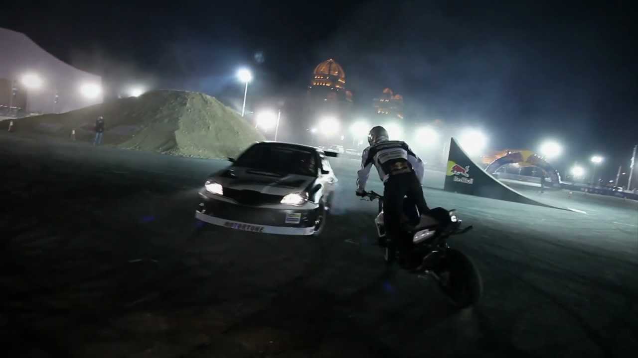 Drifting, FMX, and Motorbike Stunt riding at night - Qatar Motorshow 2012