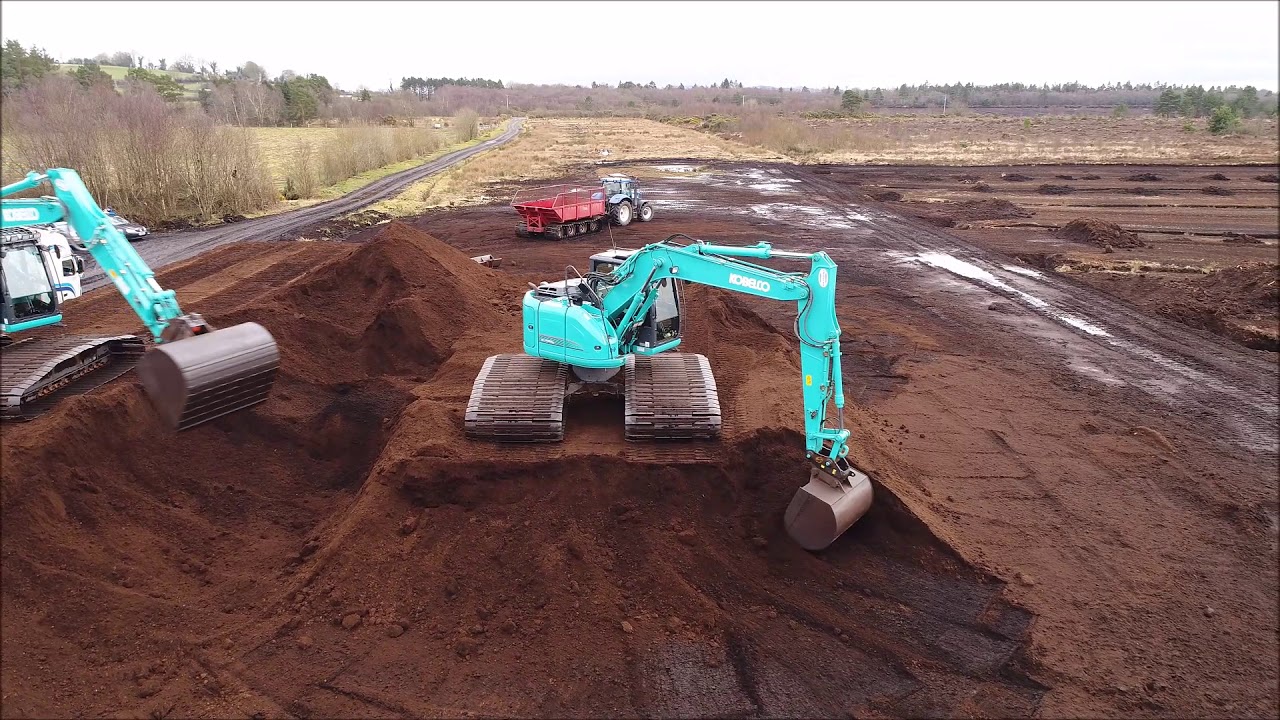 Kobelco Sk140 SRLC Loading Peat