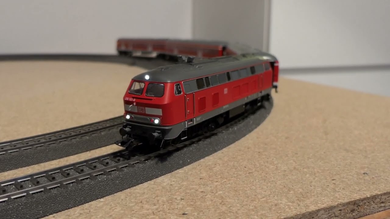 M&auml;rklin 26218 - BR 218 zieht N-Wagen Rotlinge