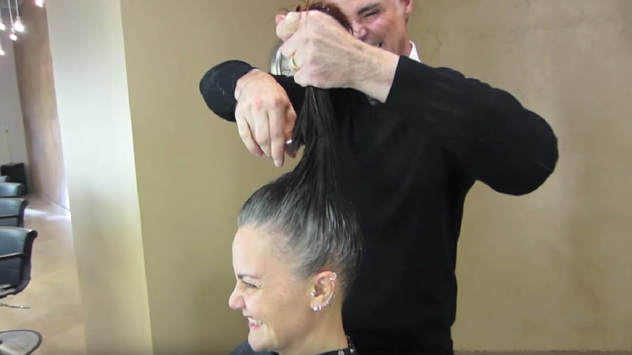 Woman fed up hiding her grey hairs – goes for new look with stylist and is totally unrecognisable