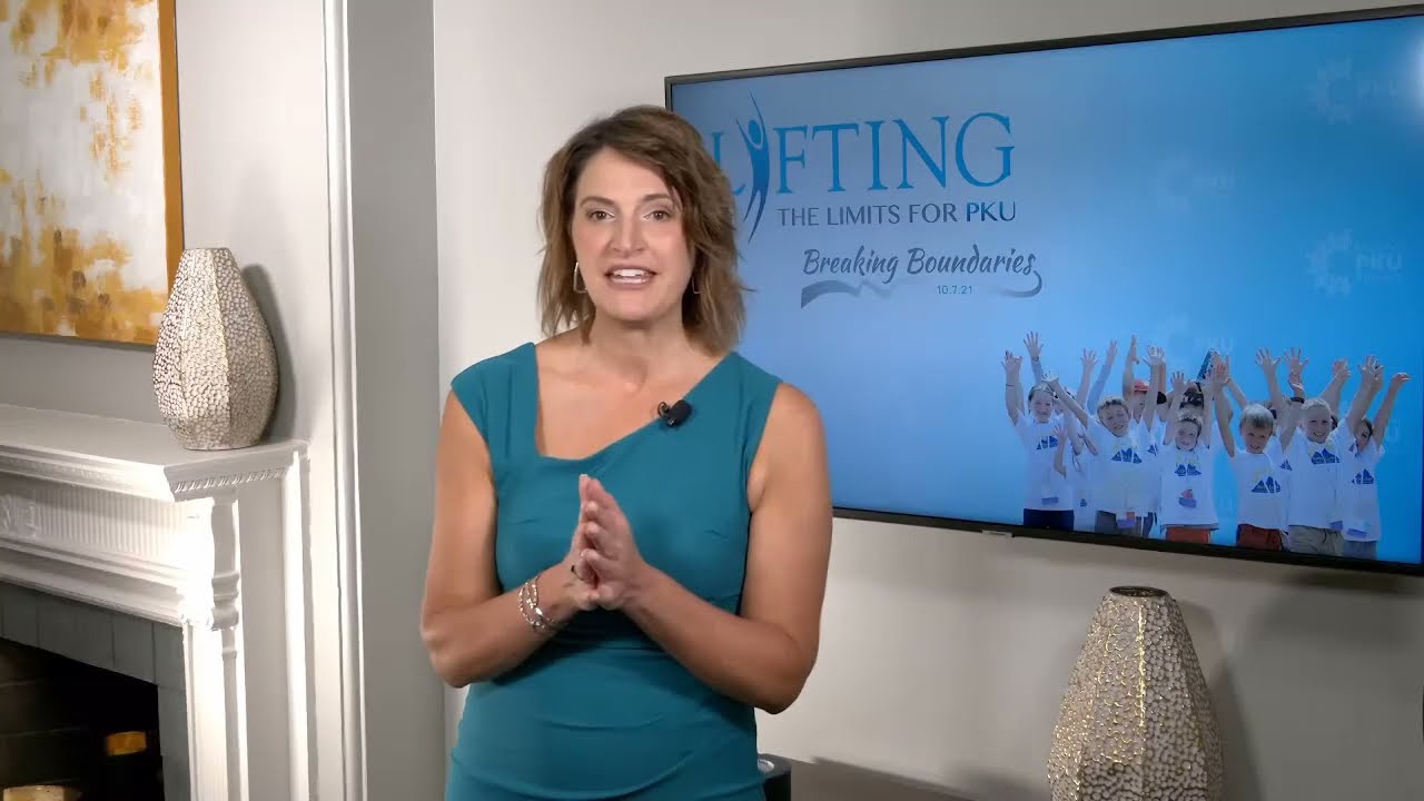 Virtual gala - Sherry Truhlar paddle raise in 2-screen solution style
