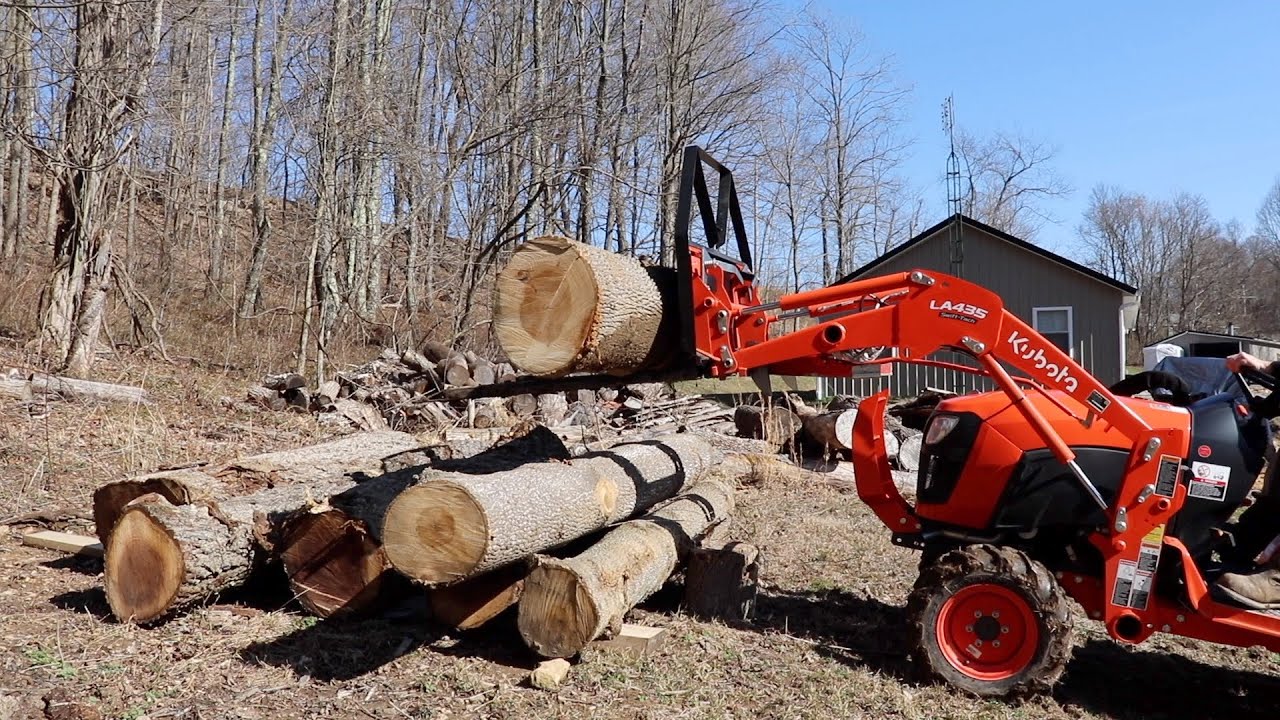 moving logs on the homestead kubota b2301