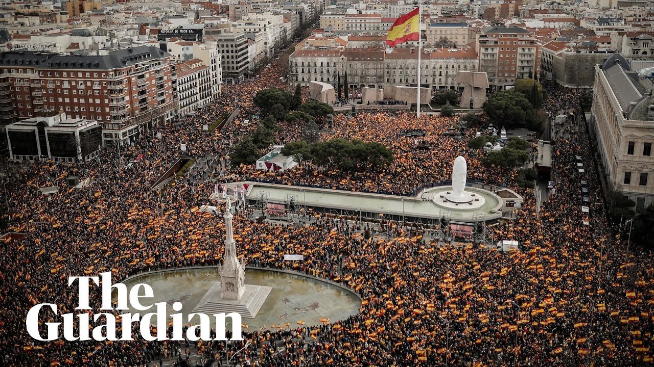 Protesters in Madrid call for their prime minister to resign