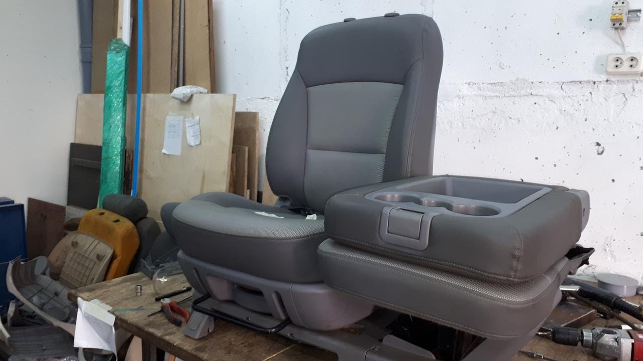 HYUNDAI GRAND STAREX.Раскладушка под левый локоть. Clamshell under the left elbow.