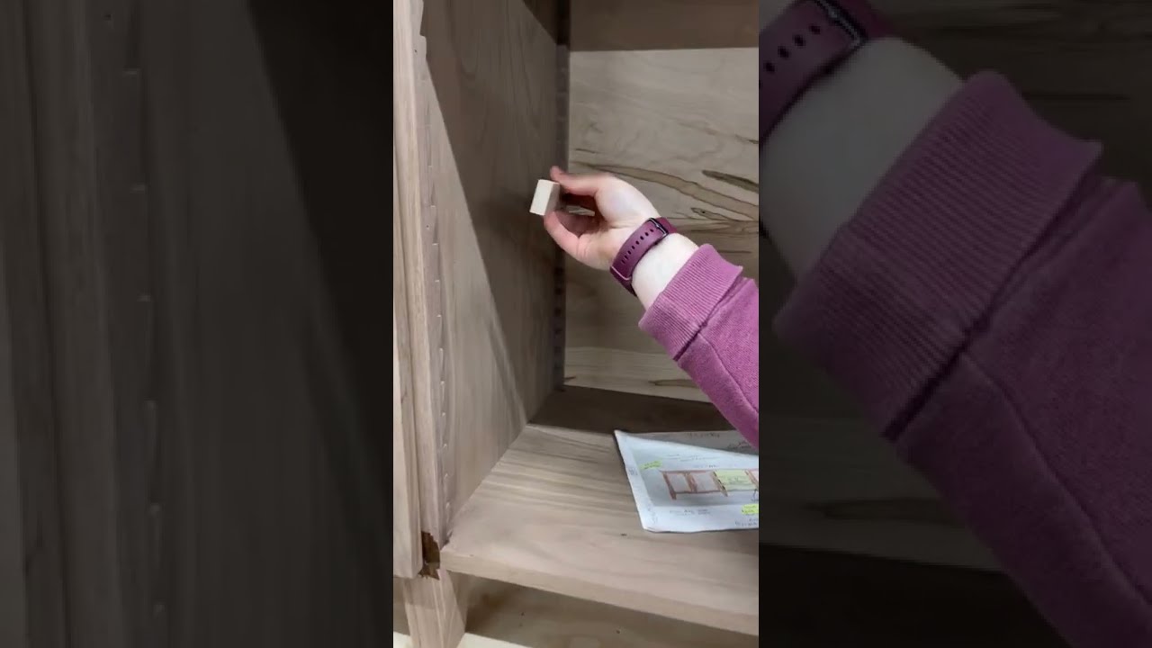 Putting in shelf brackets for Sawtooth shelf system