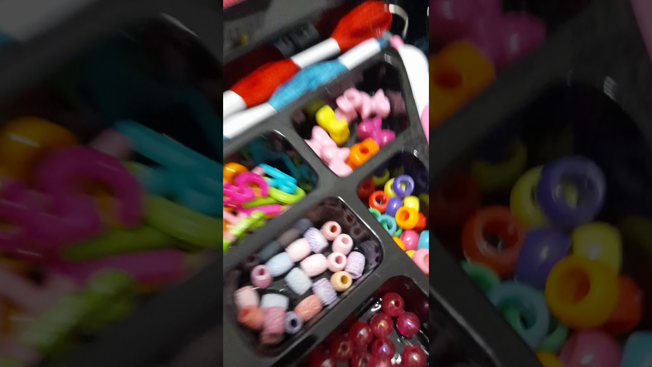 Me unboxing bracelet braiding kit.