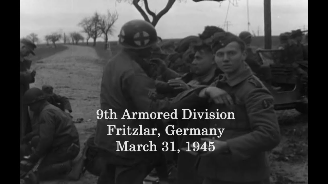 9th Armored Division with German Prisoners in Fritzlar, Germany; March 31, 1945