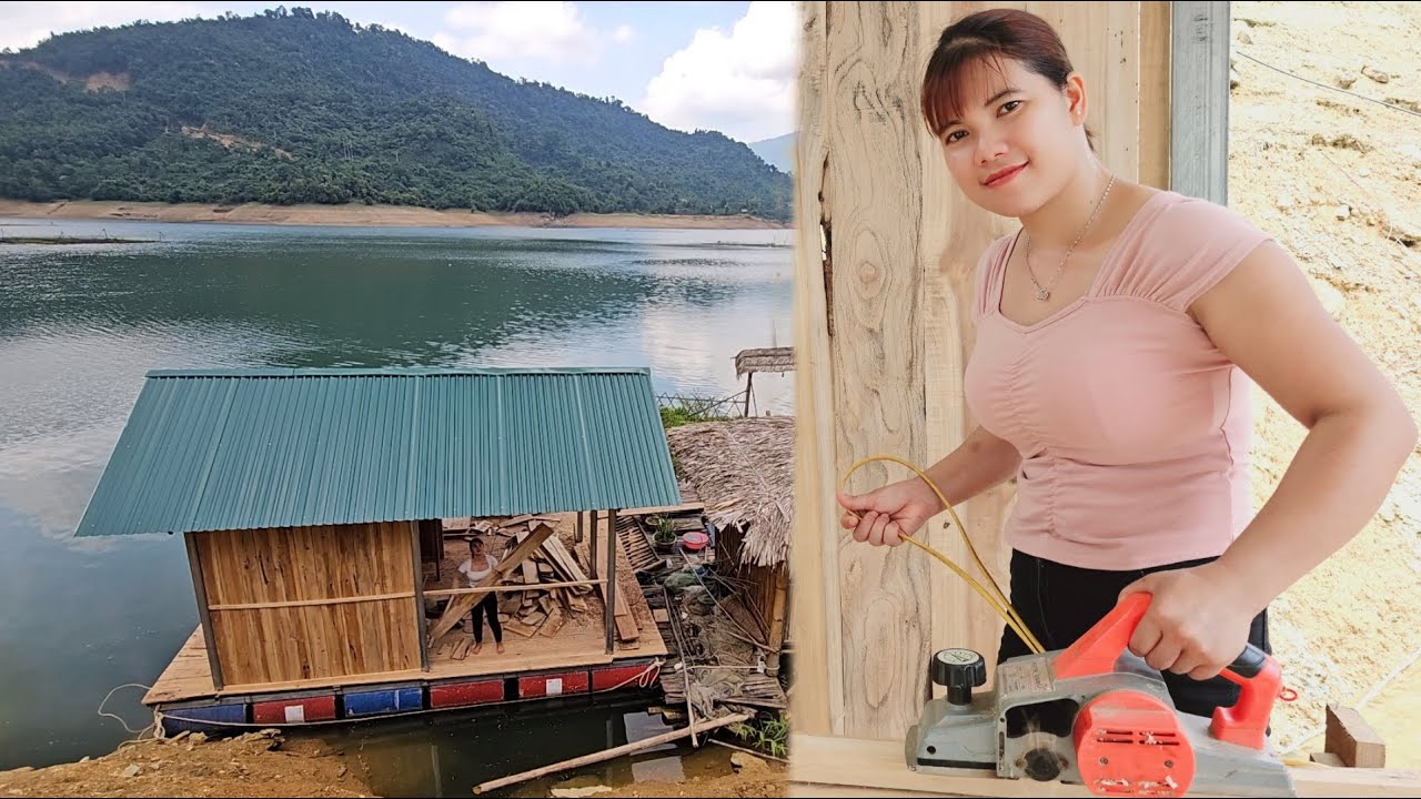 The girl is about to complete a house floating on water.
