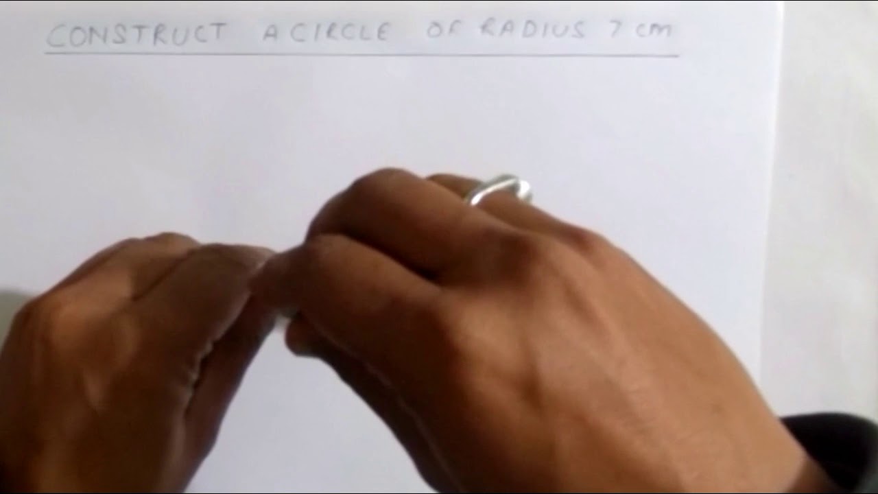 Construct a circle of radius 7 cm