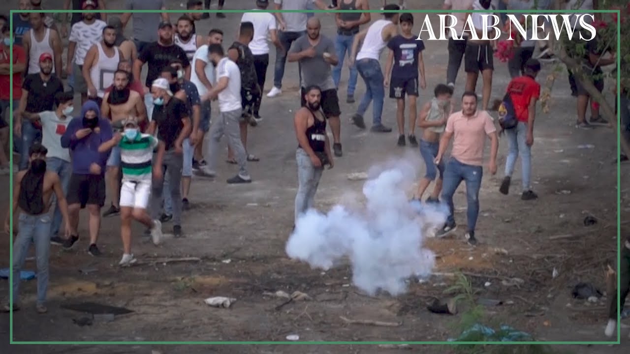 Protesters clash with Lebanese army after Hariri steps down