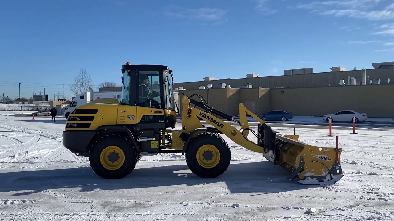 Learning to plow in a Yanmar V12 loader with Metalpless live edge blade