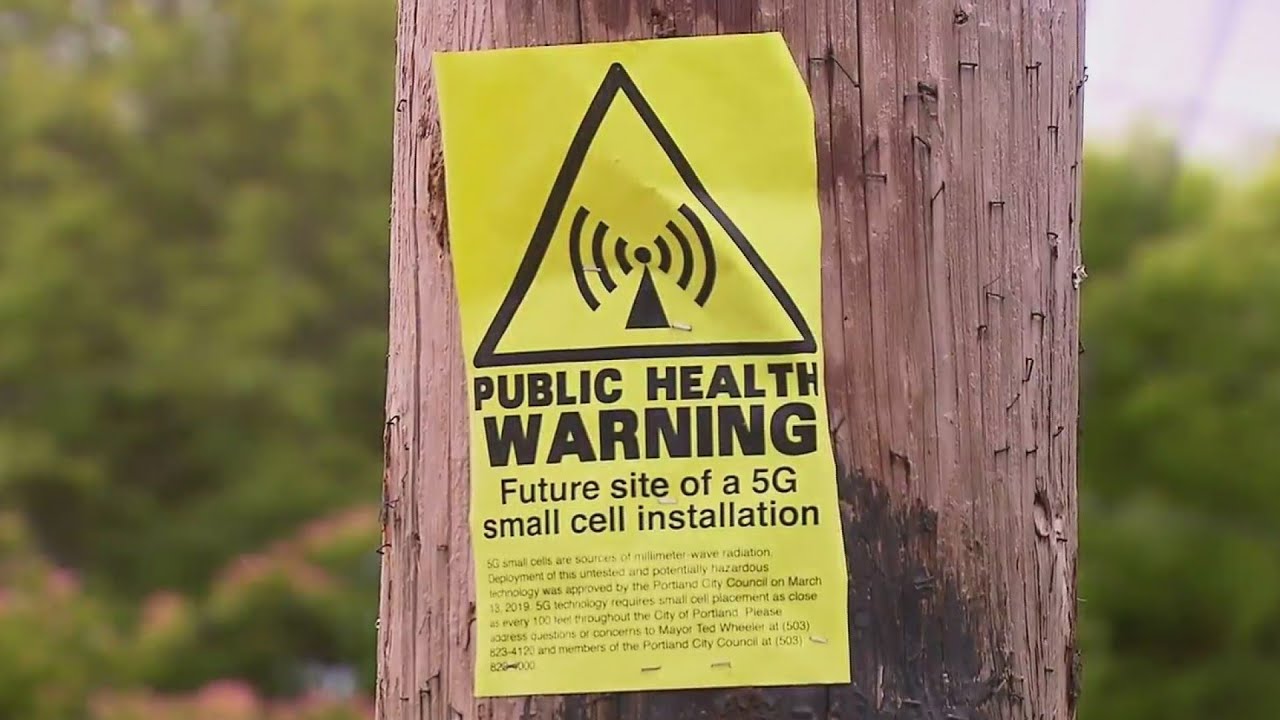 5G cell tower critics post 'health warning' signs