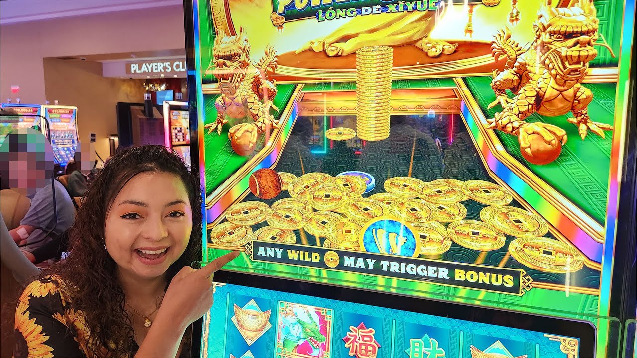 There is a Coin pusher built into this slot machine!