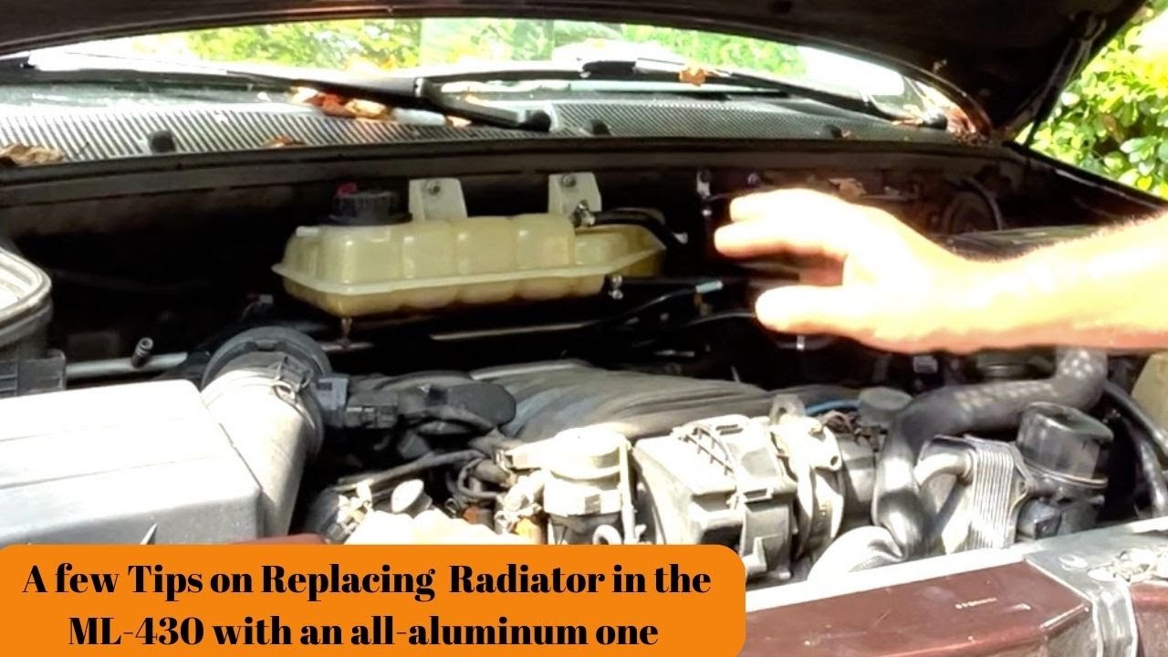 Radiator Replacement in a Mercedes. All aluminum, with some modifications to fit.