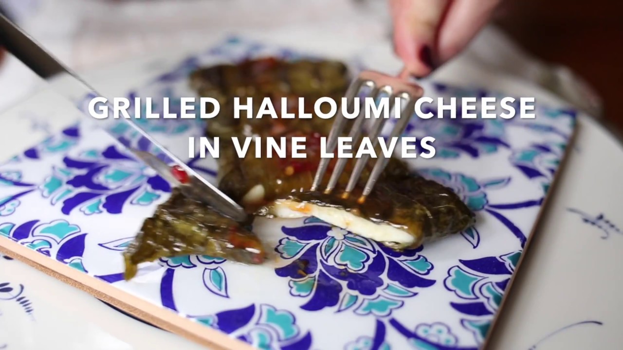 Grilled halloumi wrapped in vine leaves recipe