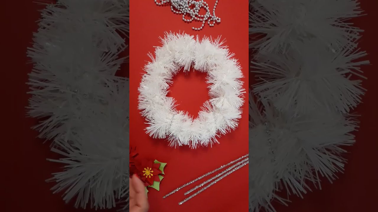 Ghirlanda Natalizia con stelle di natale fai da te