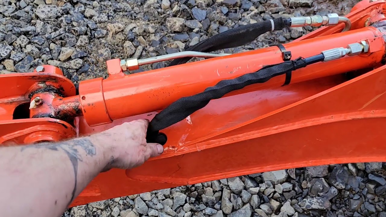 replacing a seperated hydraulic line on the kioti backhoe