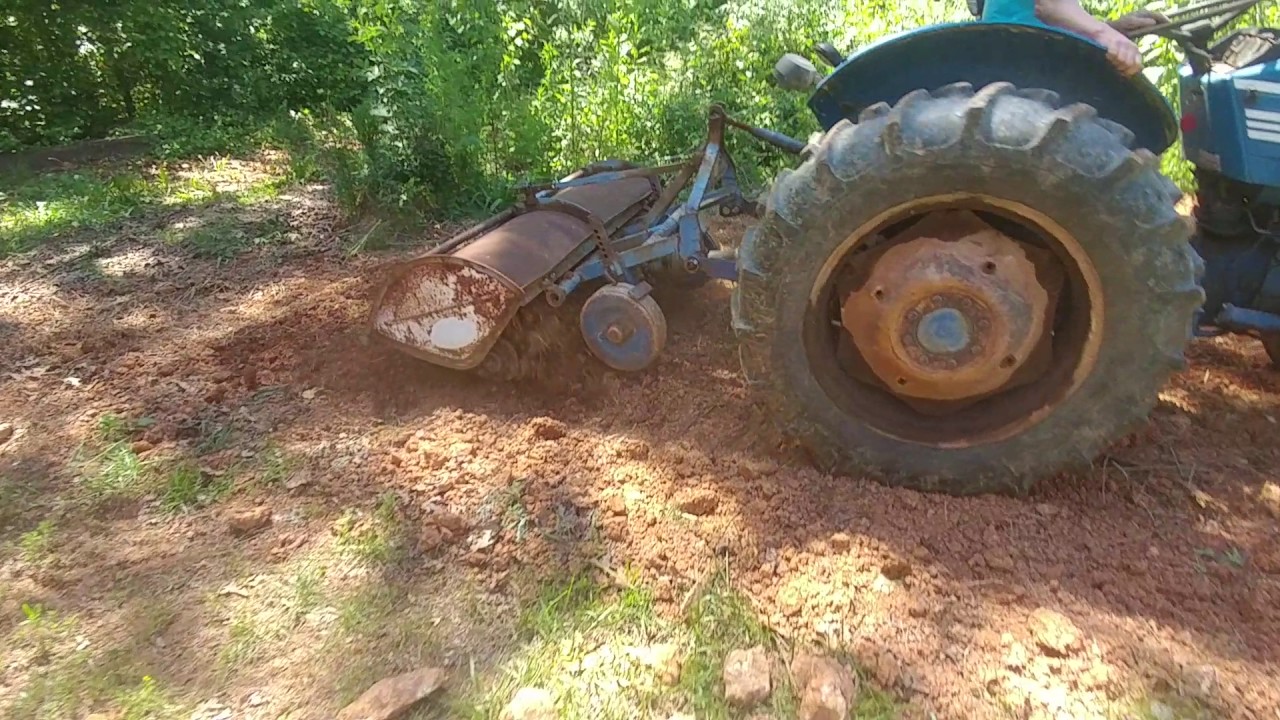 Long 310 Tractor tilling the garden - Great Sound!