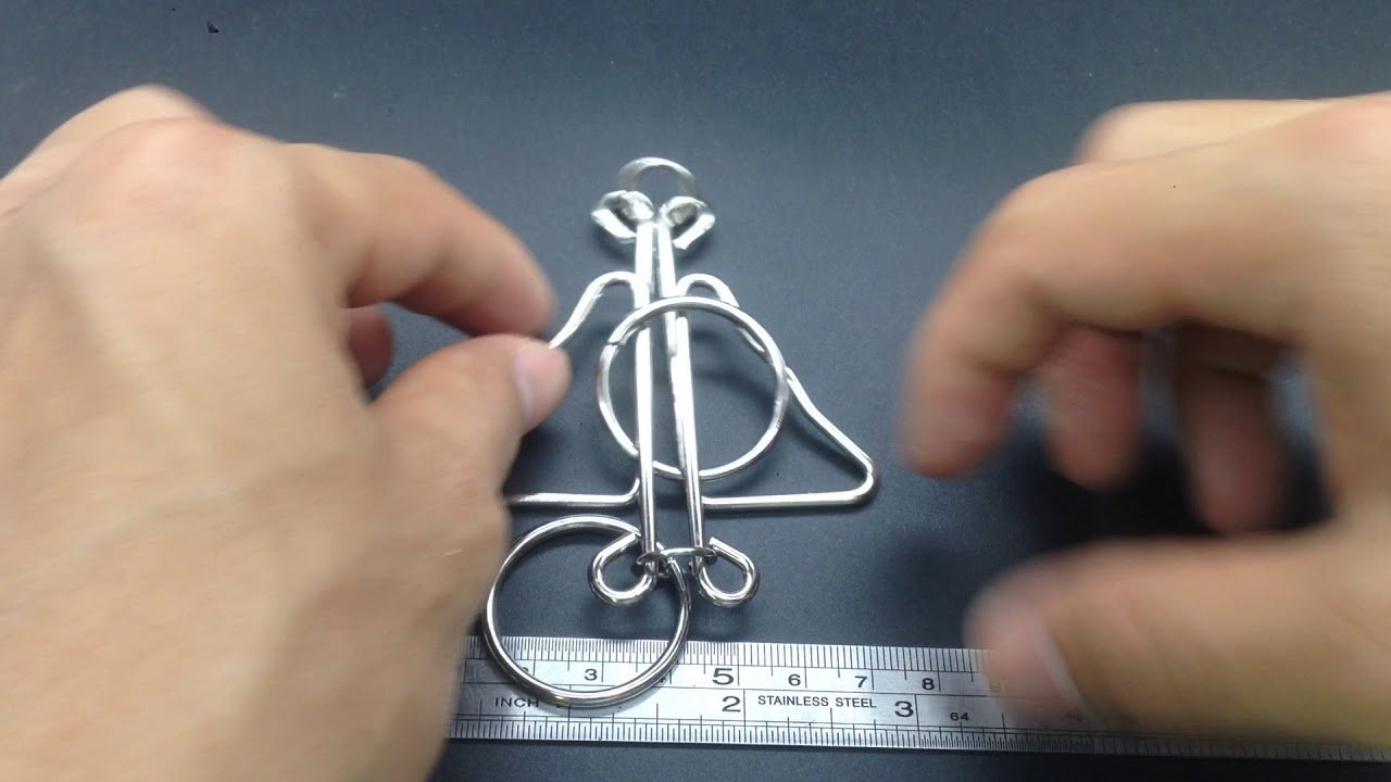 H004  /  metal ring puzzle toy  /  metal cast puzzle toy  /  yongchaofeng@hotmail.com