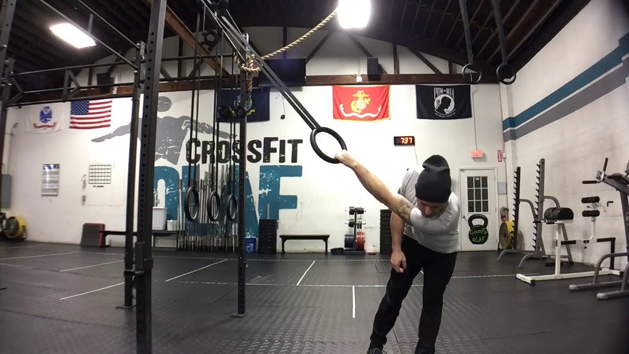 Single arm twisting hang