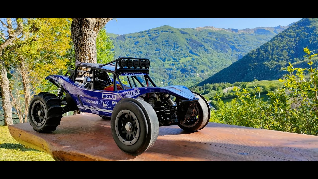 HPI  BAJA  WITH  KRAKEN SX5  SIDEWINDER ROLL CAGE