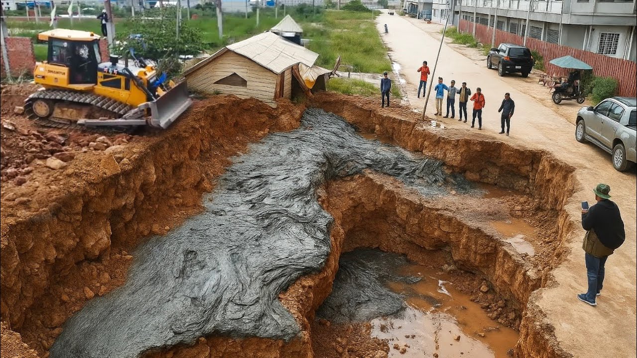 Shantui Bulldozer Pushing Soil Bury Mud By Using 25T Dump Trucks Loading Soil