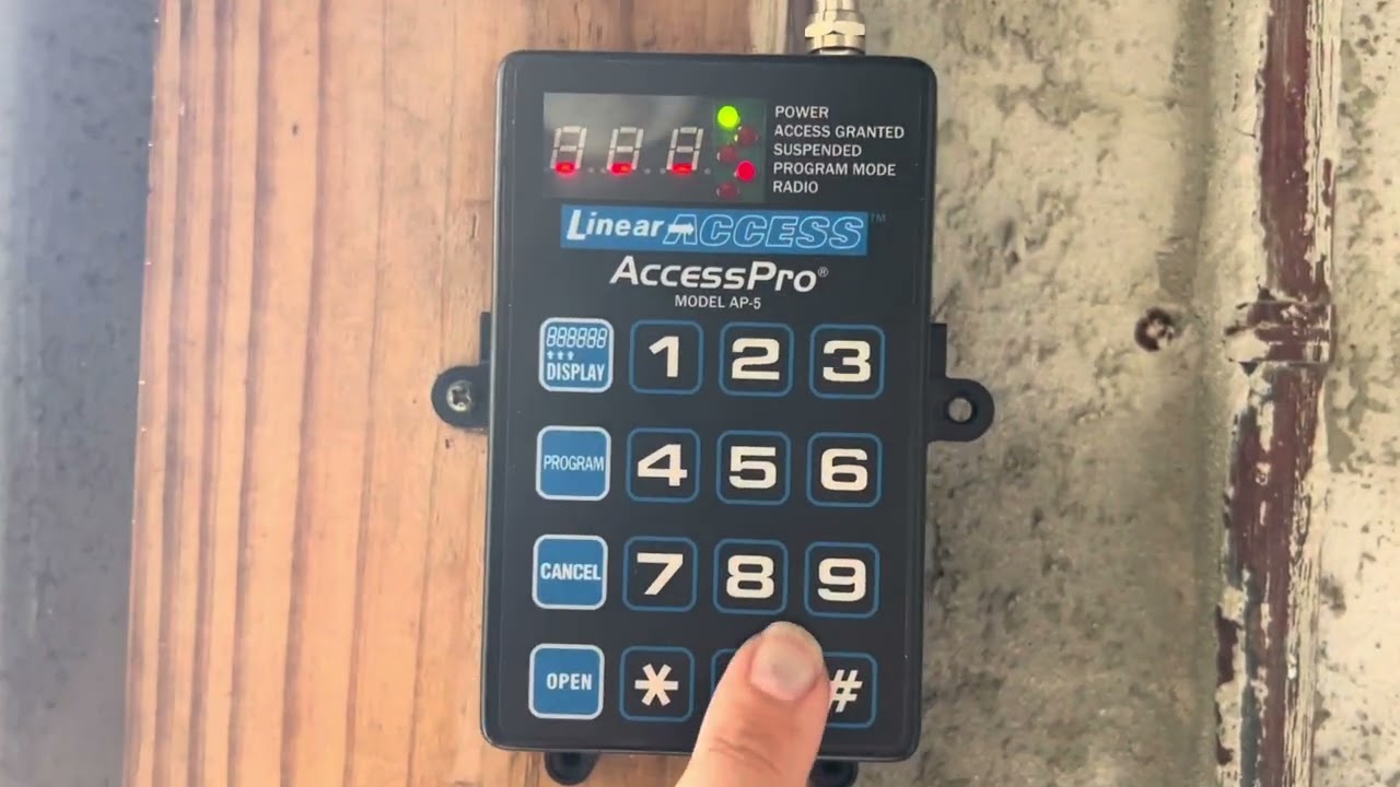 How to program your personal garage door remote opener, into Linear AccessPro AP-5 opener