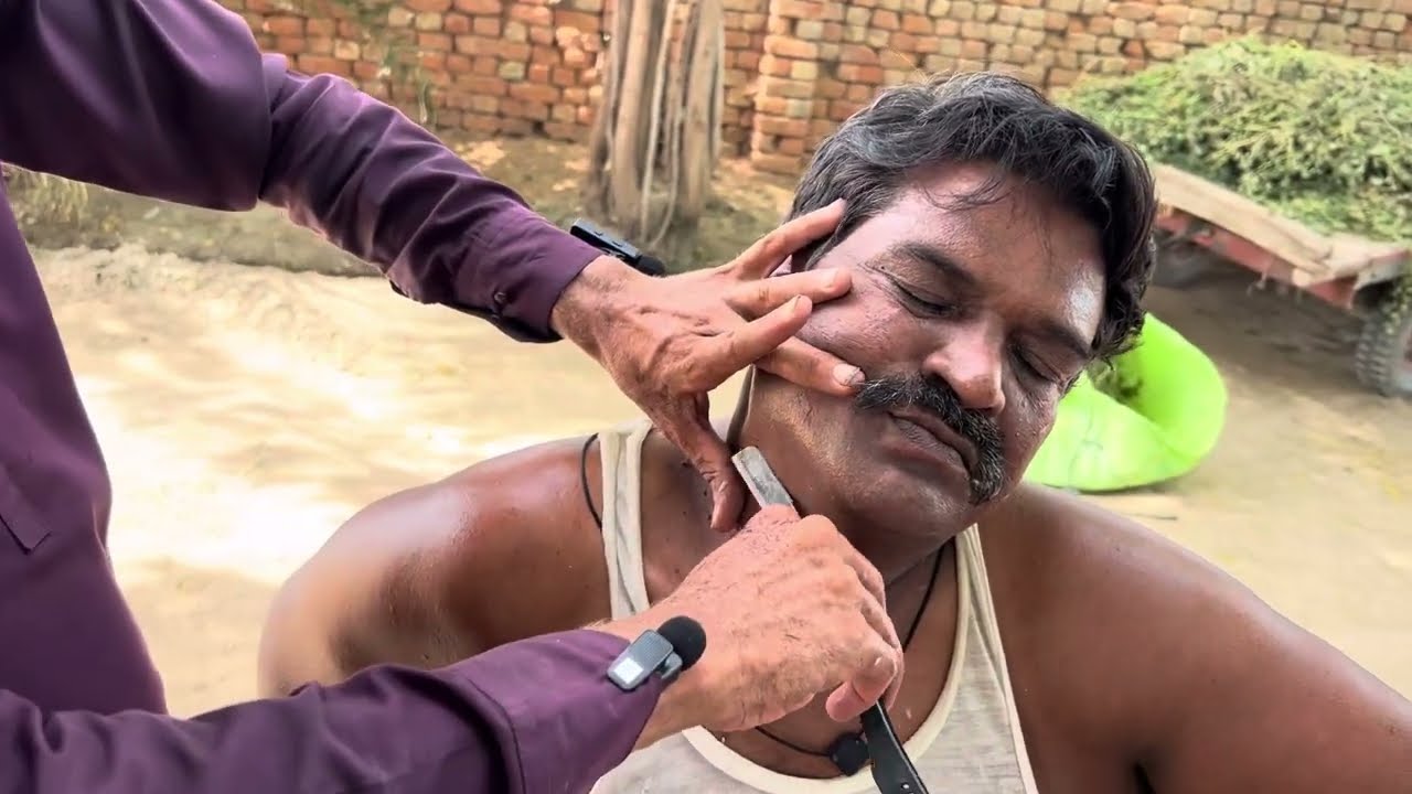 Experience the ultimate ASMR relaxation with a fast and aggressive shave in my village! 