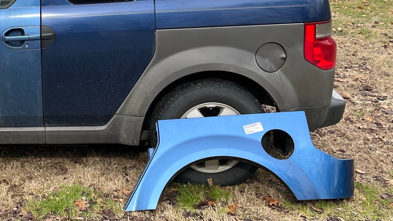 Installing 2006 rear fender plastic cladding on a 2003 Honda Element.