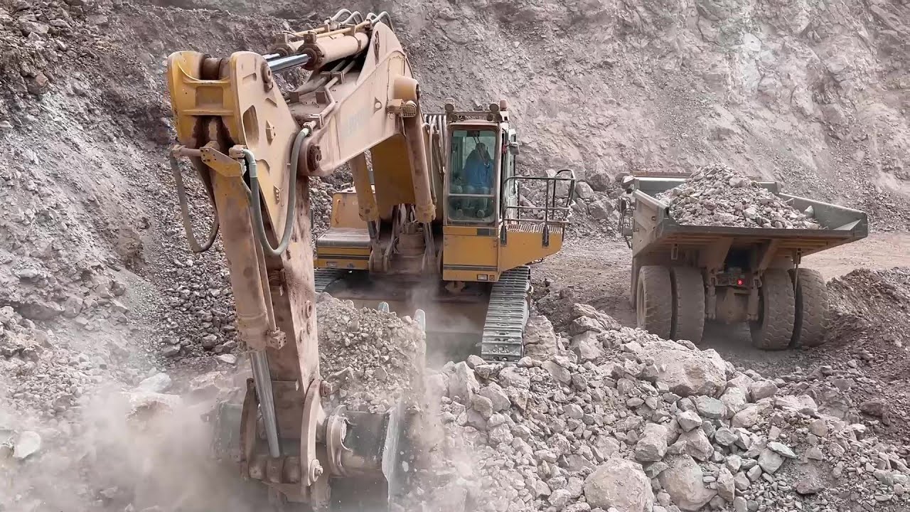 Liebherr 974 Excavator Loading Caterpillar 775 Dumpers - Sotiriadis/Labrianidis Quarry Works