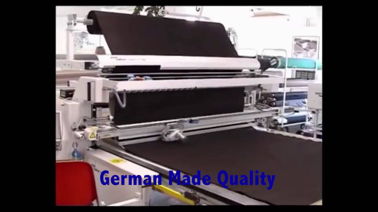 AUTOMATIC FABRIC SPREADER AND CNC CUTTING MACHINES