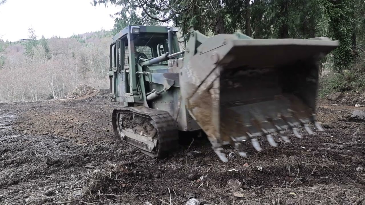 Track Loader Cuts Fills and Grades