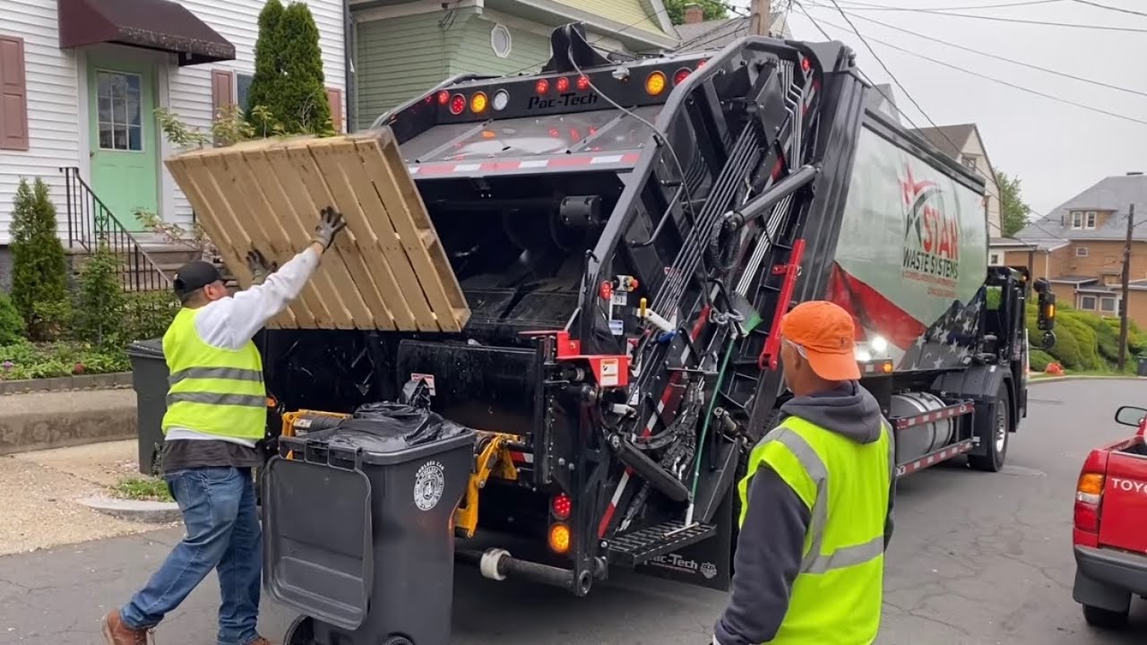 Brand New Flip Door Battle Motors 32 Yard PacTech Garbage Truck