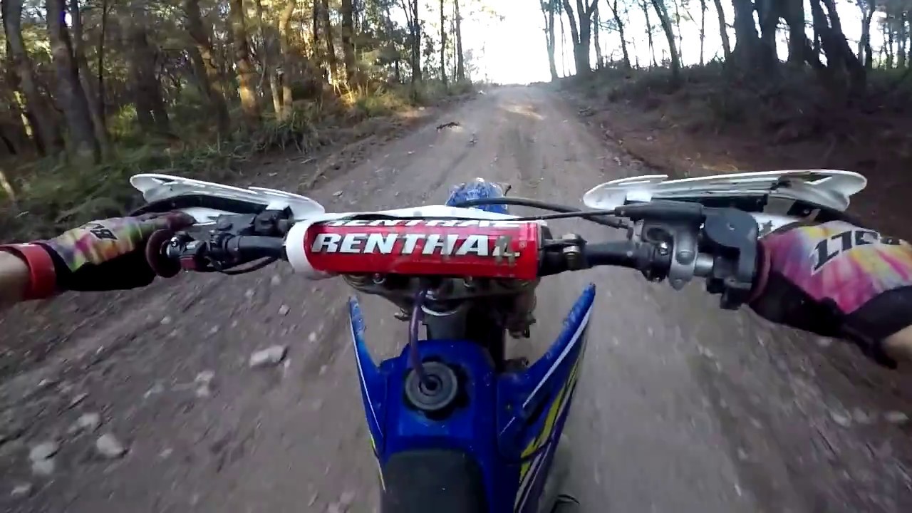Single track hill climbs and wheelie practice on the Yz300