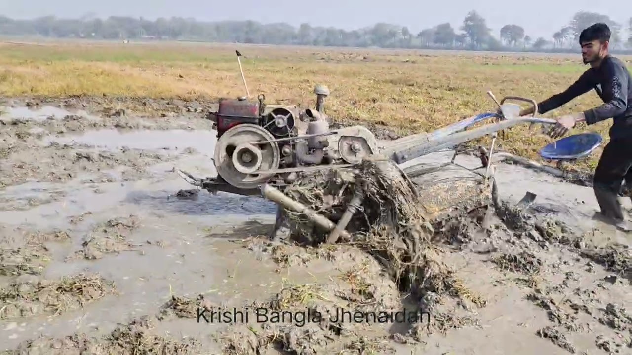 টিলার এর চাকায় লাঠি বেধে দপালো জমিতে চাষ করা হচ্ছে। #গ্রামবাংলা #বাংলারকৃষক #টিলার #কৃষকের_বুদ্ধি 