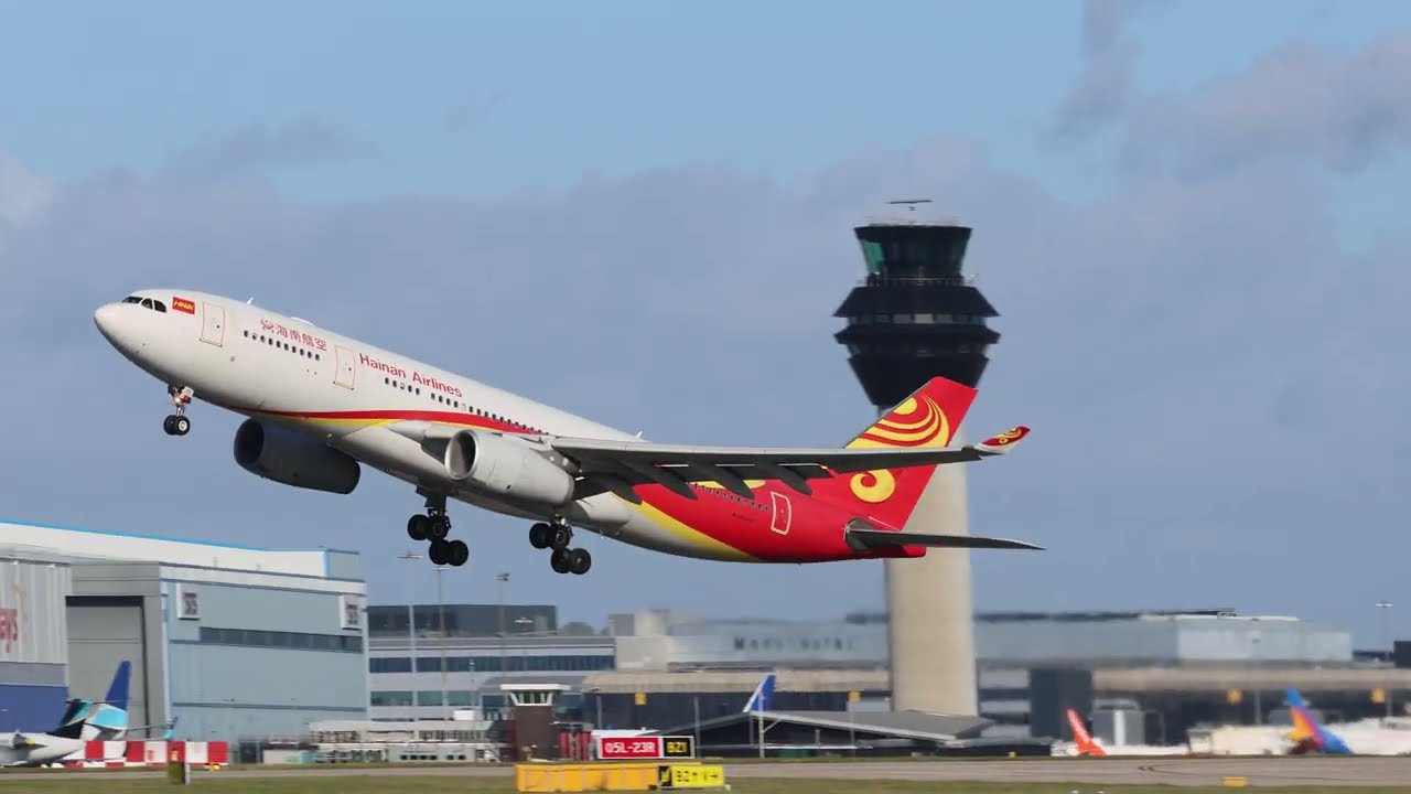 Cathay Pacific A350-900 and Hainan A330 departing Manchester