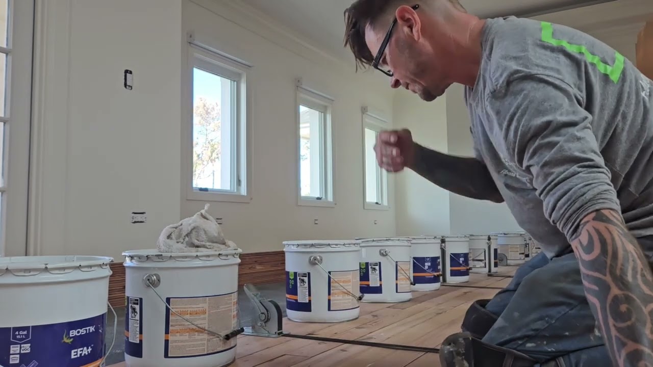 Gluing Down and Ratchet Strapping Reclaimed Flooring