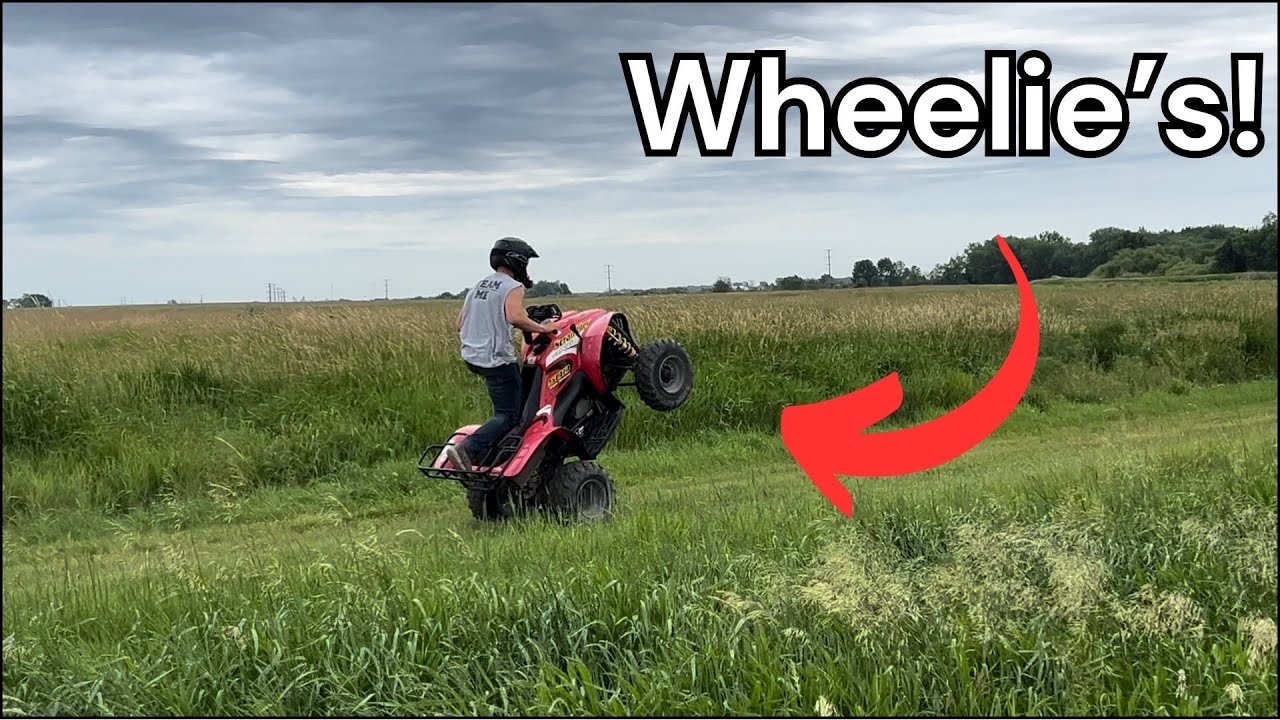 Polaris Scrambler 500 Wheelie's!