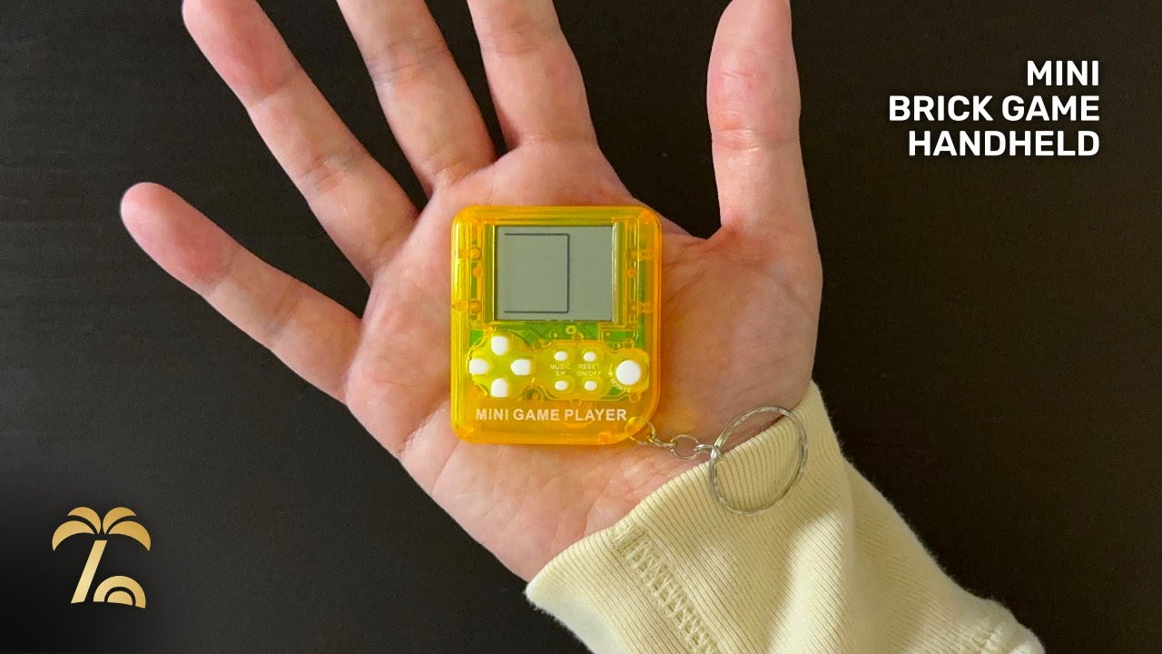 This cheap handheld is nearly the size of a palm ✋ | Mini “Brick Game” Handheld Keychain