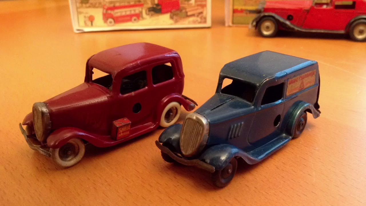 A sample of british- made, vintage tinplate motor cars.