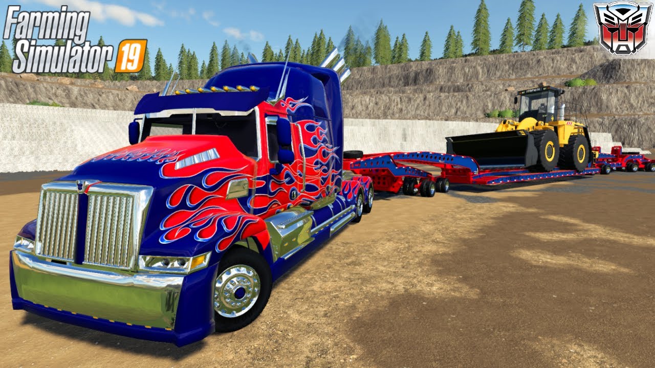 Farming Simulator 19 - WESTERNSTAR OPTIMUS PRIME Transports An Oversized Giant Wheel Loader