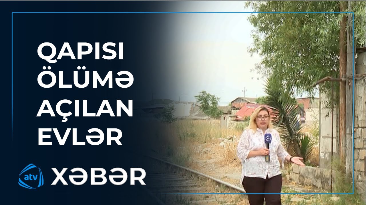 İnsanlar dəmiryol xəttinin bir addımlığında yaşayır