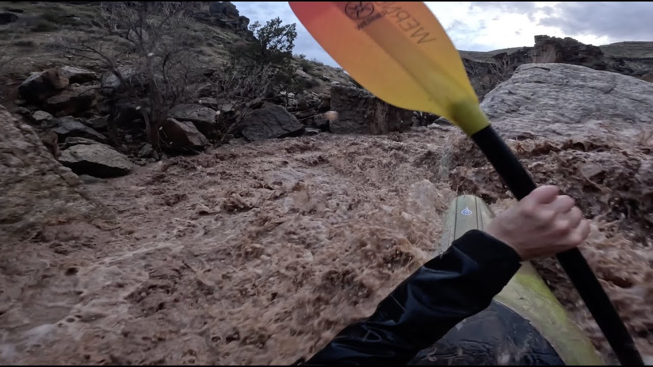 Kayaking Timpoweap Canyon at highwater