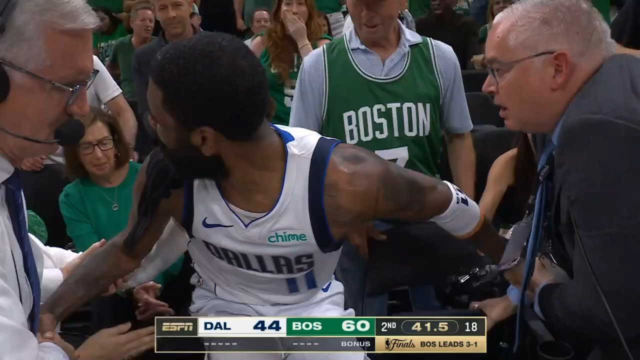 Kyrie Irving gets into it with Celtics fan after diving into crowd "f**k is wrong with you"