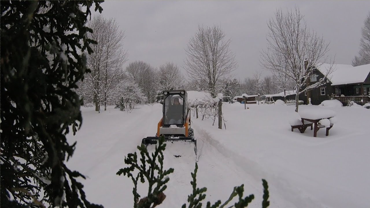 Bobcat 440b with HLA 1500 snow pusher