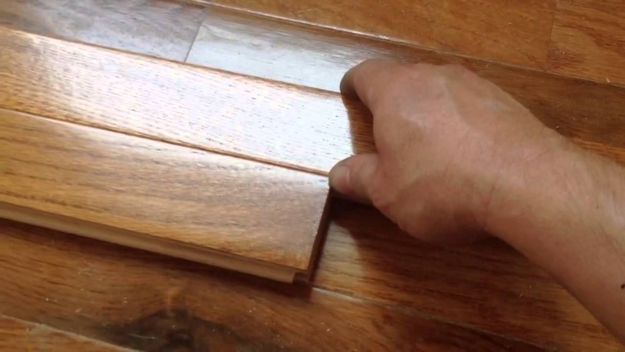 Wood flooring spline reverse the direction of floor