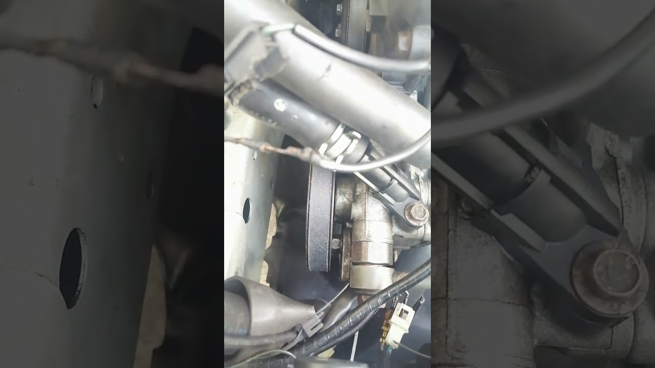 Adjusting Steering Pump Belt Mazda Lantis Familia 323 / Part 1